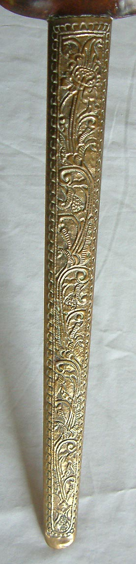 19th century to early 20th century ivory handle Indonesian kris dagger with brass and wood scabbard